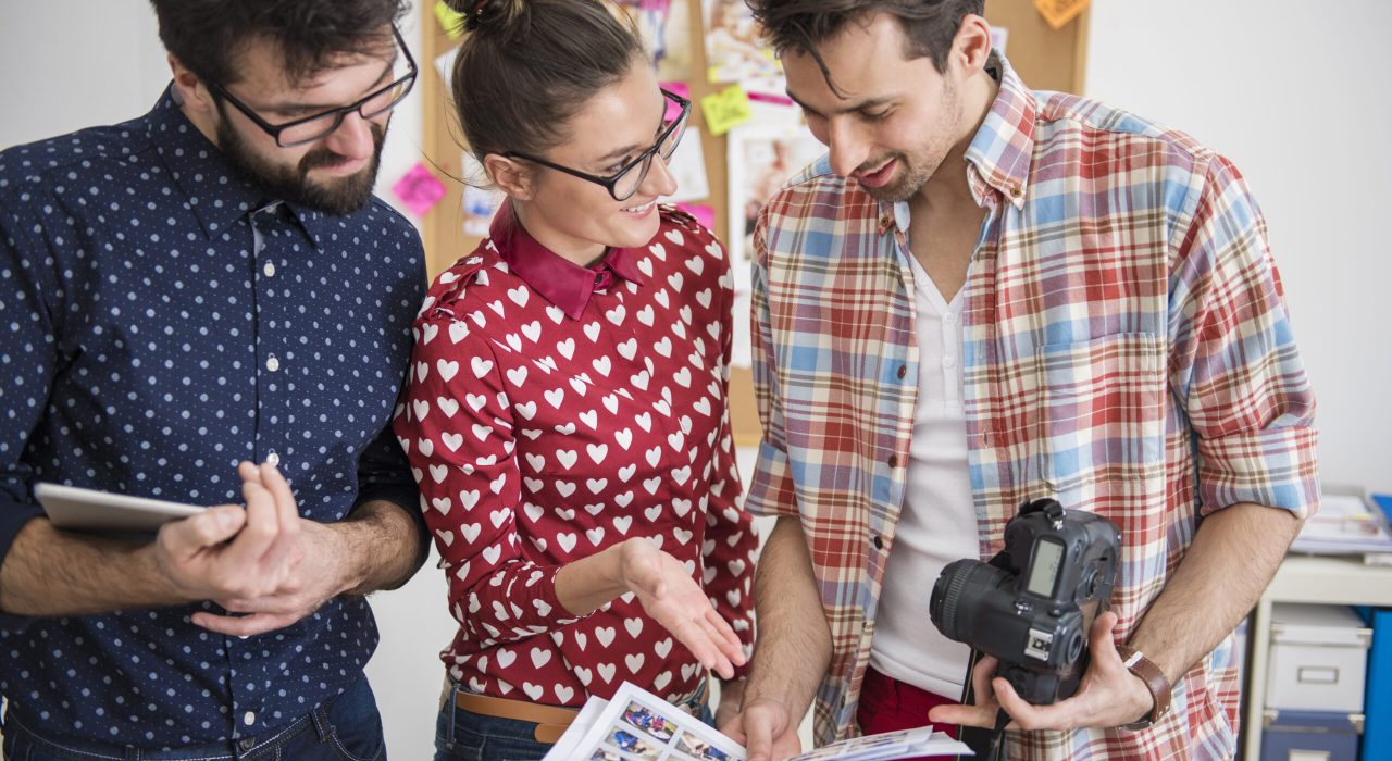 Professional photographers working at their office Professional photographers working at their office